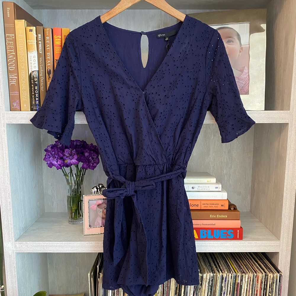 Never been worn blue romper with tags